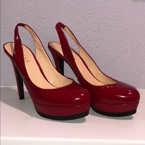 Red patent leather closed toe heels